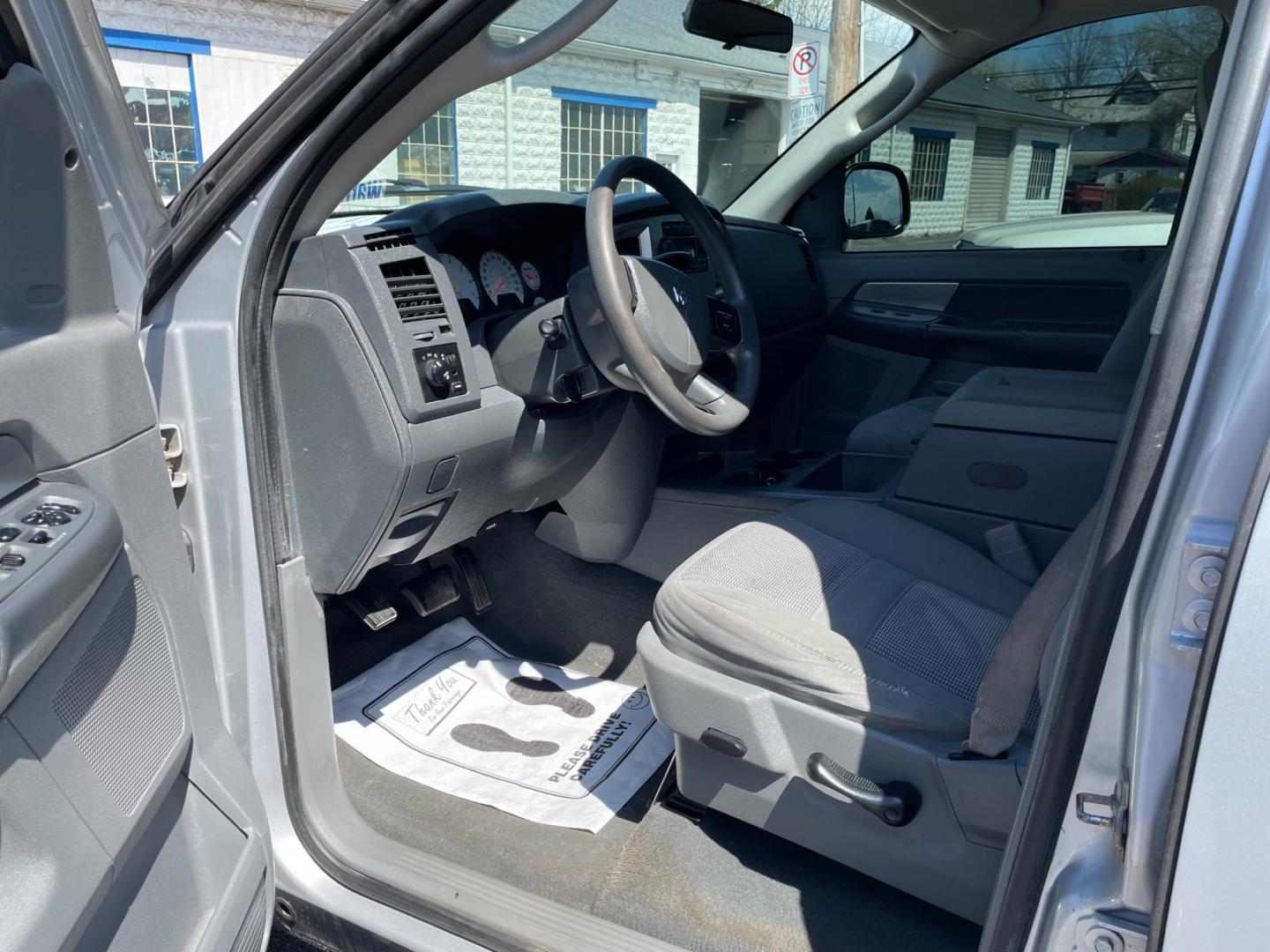 2007 silver Dodge Ram 1500 Laramie Quad Cab 4WD (1D7HU18267S) with an 5.7L V8 OHV 16V engine, 5-Speed Automatic Overdrive transmission, located at 101 N. Main Street, Muncy, PA, 17756, (570) 546-5462, 41.207691, -76.785942 - Photo#6